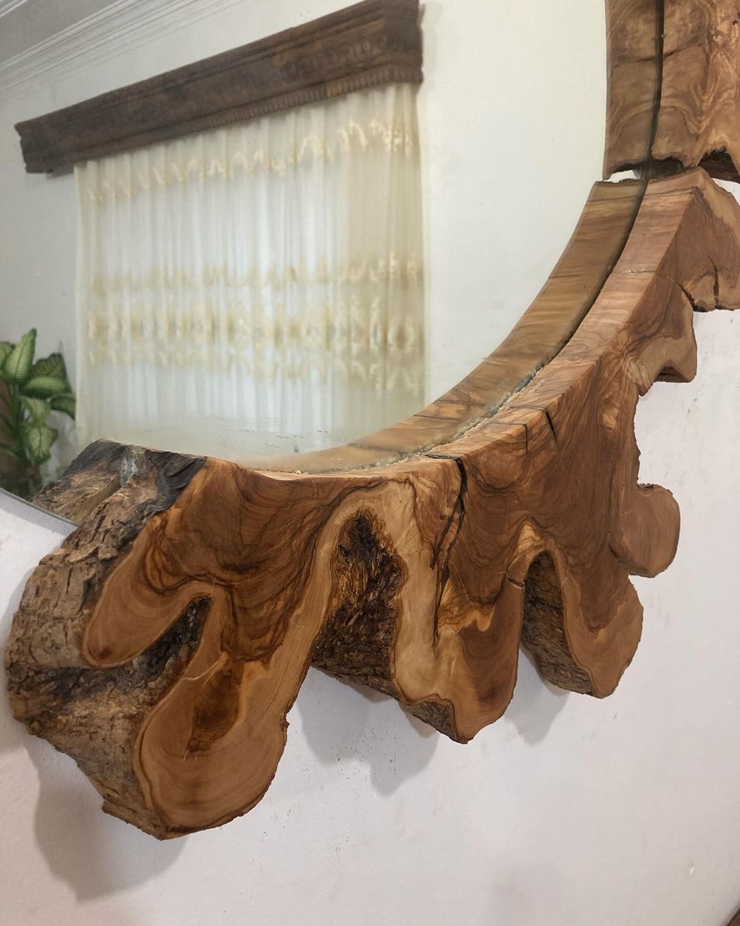 Unique live-edge wood shelf reflecting natural patterns and craftsmanship