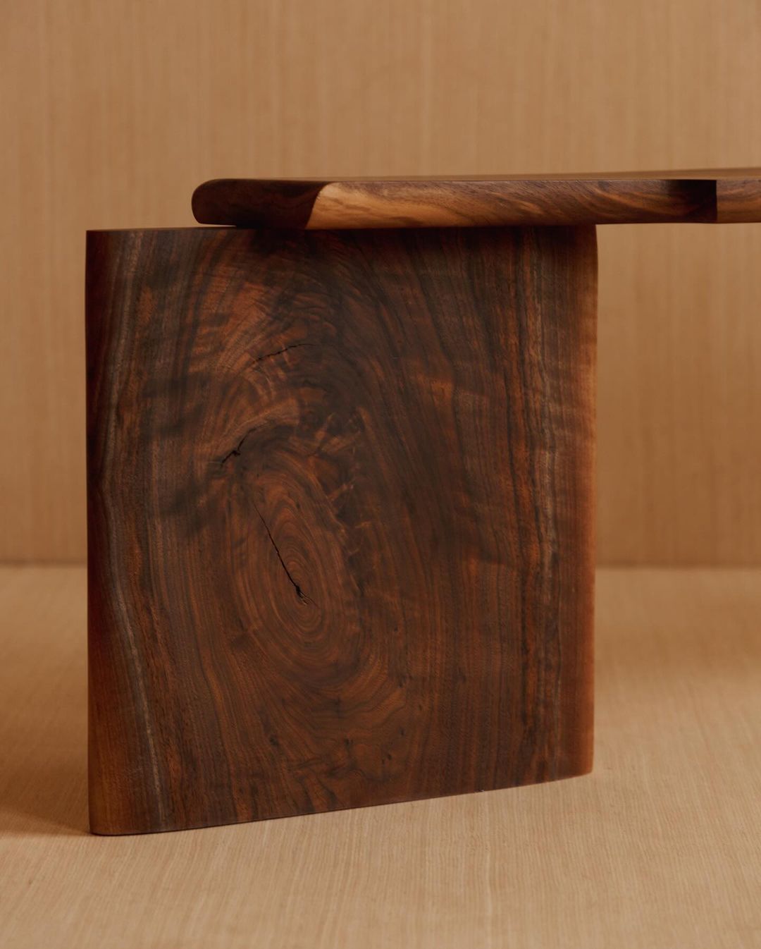 A unique wooden magazine rack showcasing intricate wood grain patterns