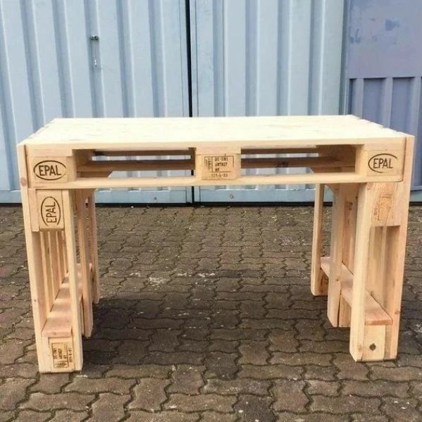 A creatively designed wooden desk crafted from repurposed pallets