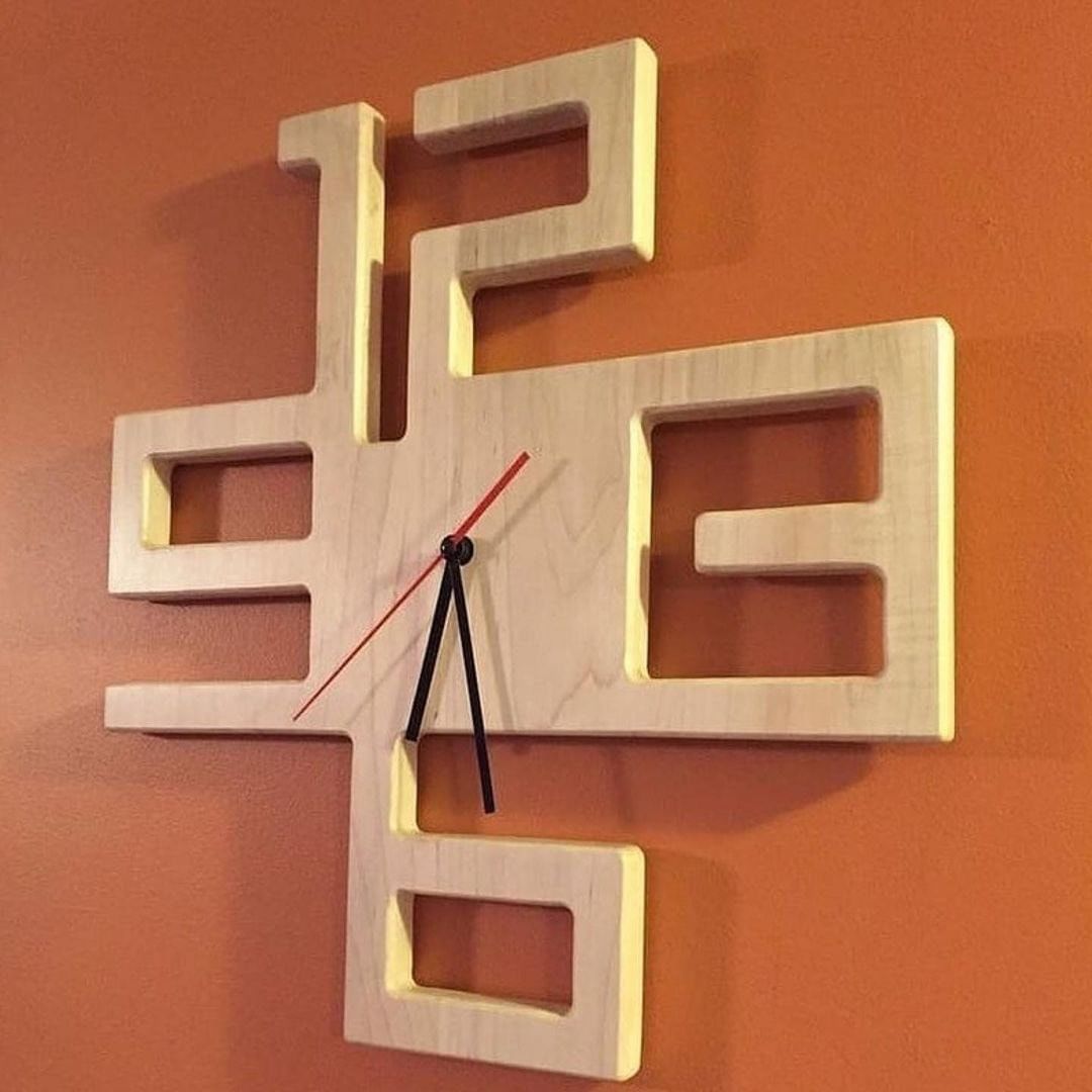 A unique wooden wall clock with cut-out numbers