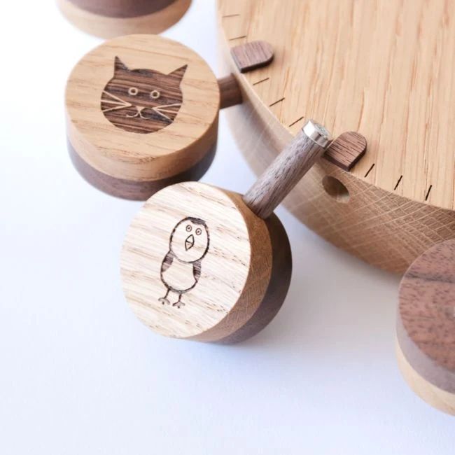 A set of whimsical wooden coasters with engraved animal designs