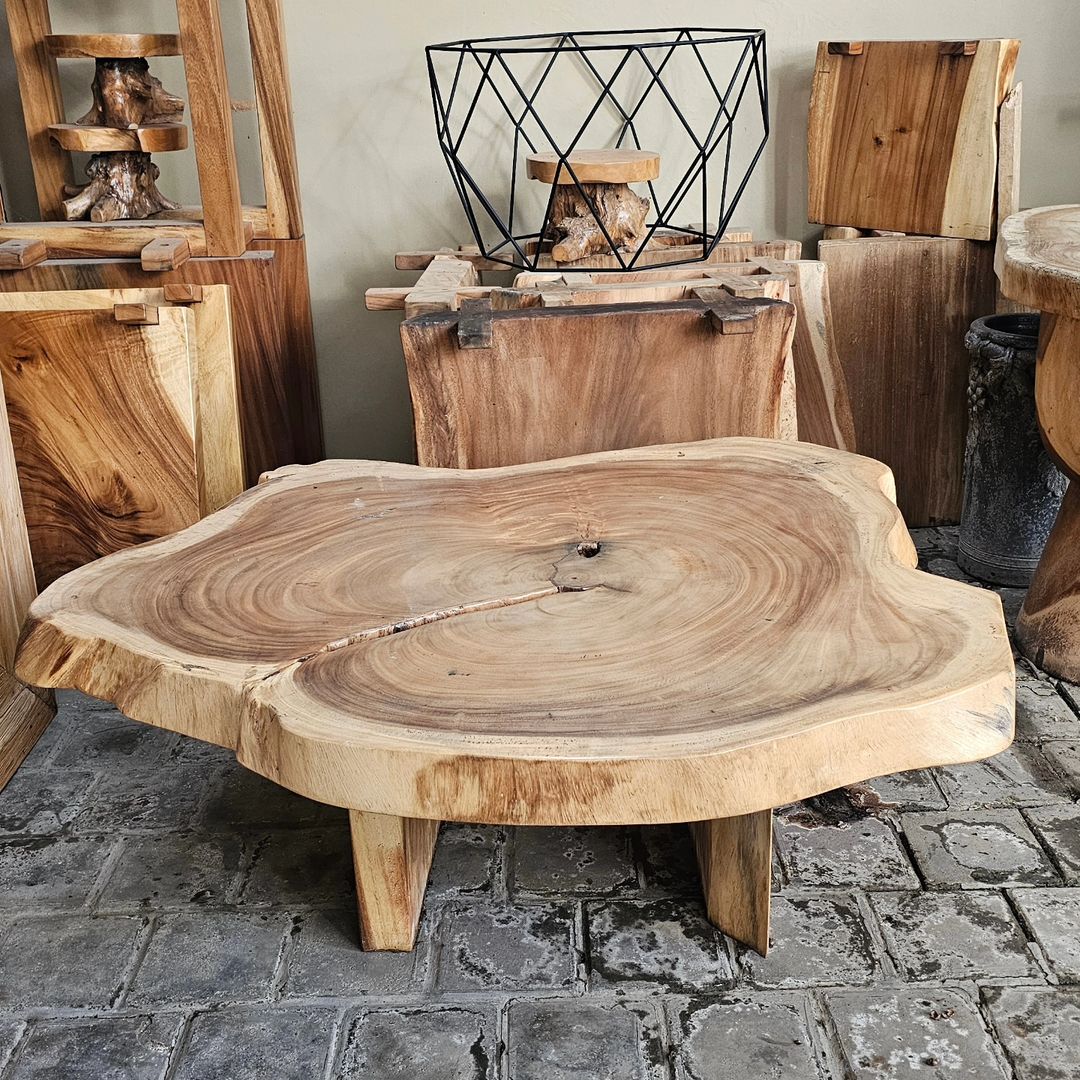 An artful selection of natural wood furniture pieces