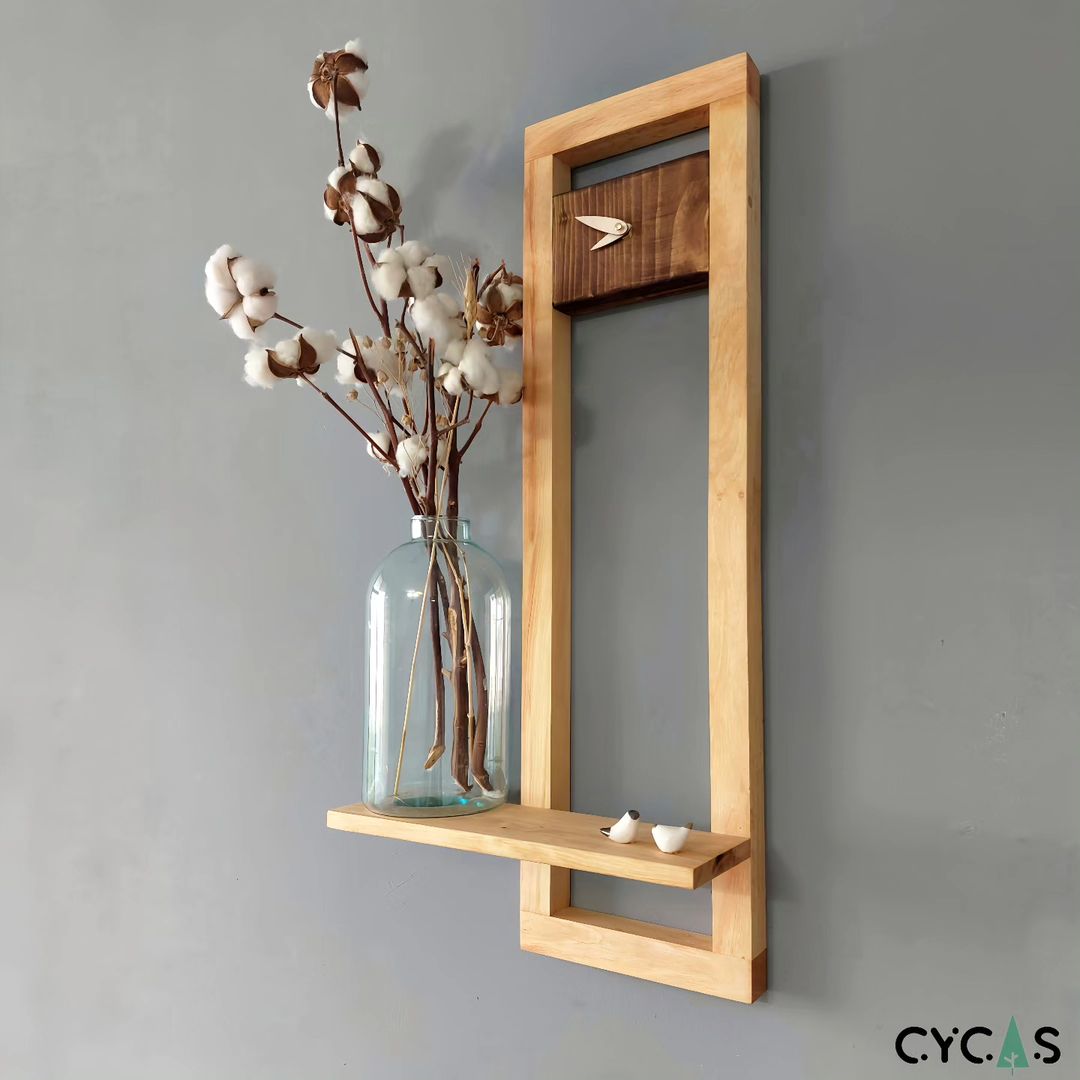 A minimalist design wooden mirror frame with an integrated shelf