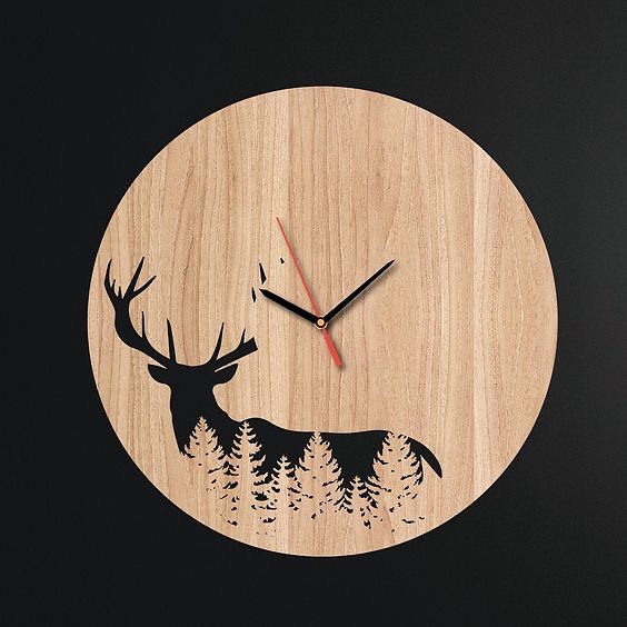 A silhouette of a stag on a wooden wall clock