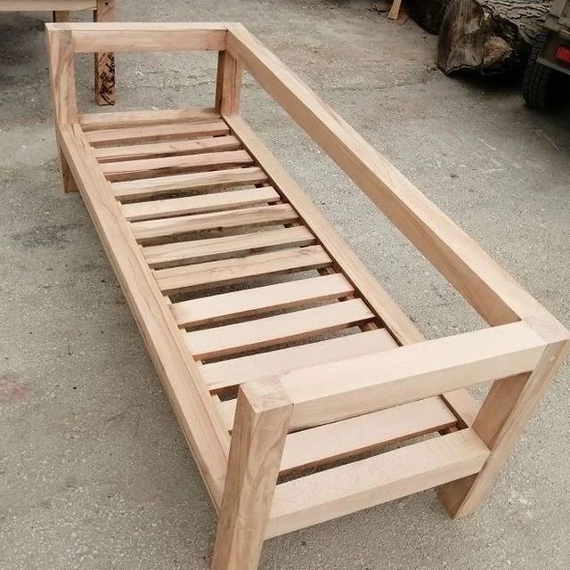 Handcrafted wooden bed frame demonstrating expert woodworking skills