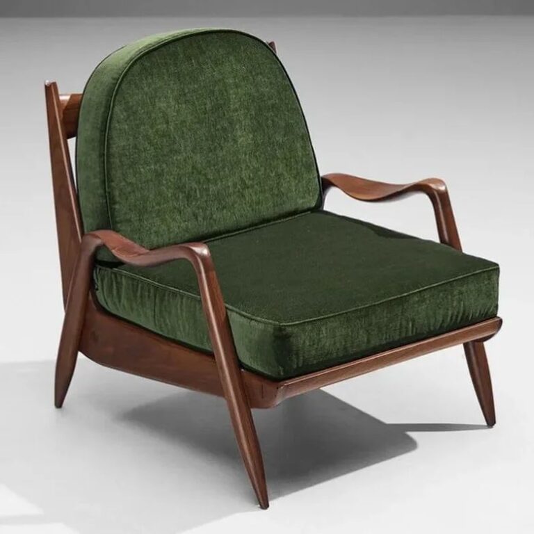 Mid-century modern armchair with green upholstery